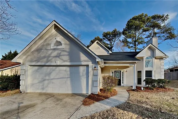 a view of a house with a patio