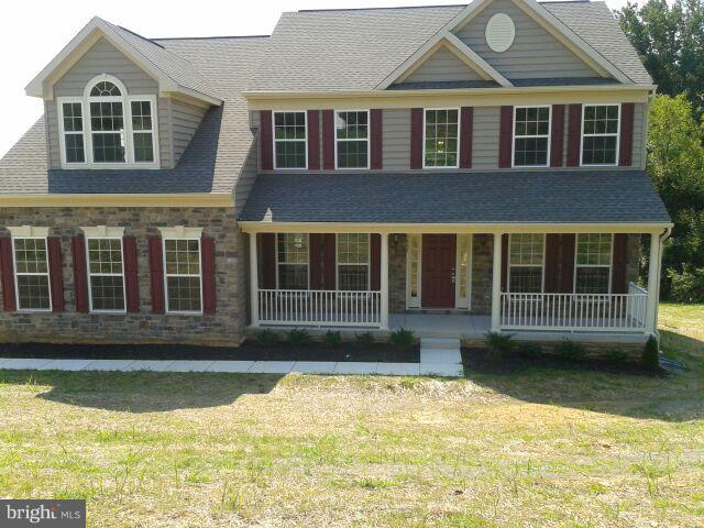 1341 Ryan Road Fallston, MD 21047 - Photo 1 of 2 a front view of a house with a yard