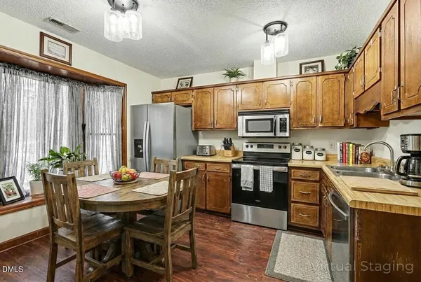 $235,499 | 117 Vlg Grn Trail, Garner, NC 27529
