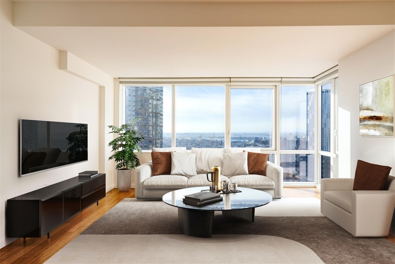a living room with furniture a flat screen tv and a large window