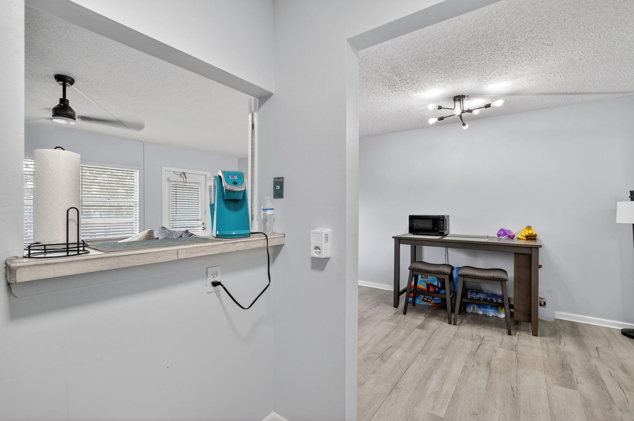 485 Mansfield K Boca Raton, FL 33434 - Photo 16 of 73 a room with a table and chairs