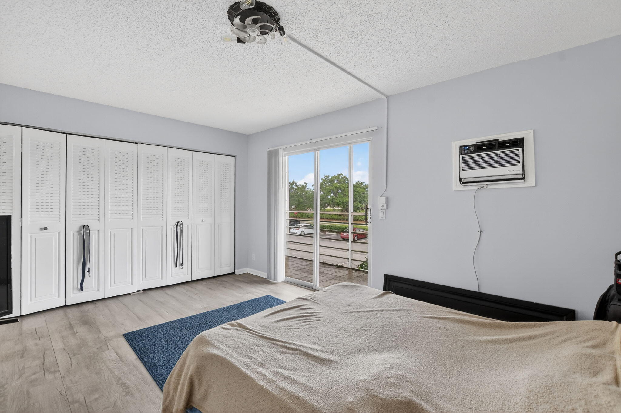 485 Mansfield K Boca Raton, FL 33434 - Photo 21 of 73 a bedroom with a bed and a window