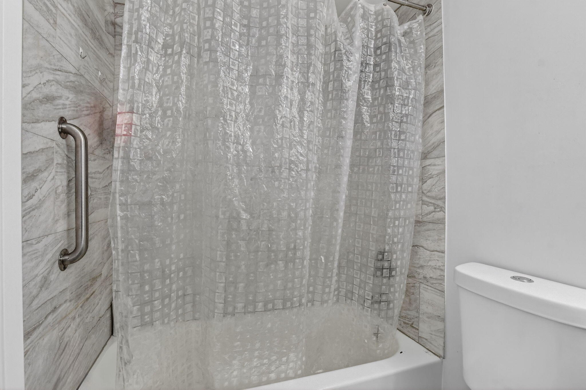 485 Mansfield K Boca Raton, FL 33434 - Photo 23 of 73 a bathroom with a shower and a toilet