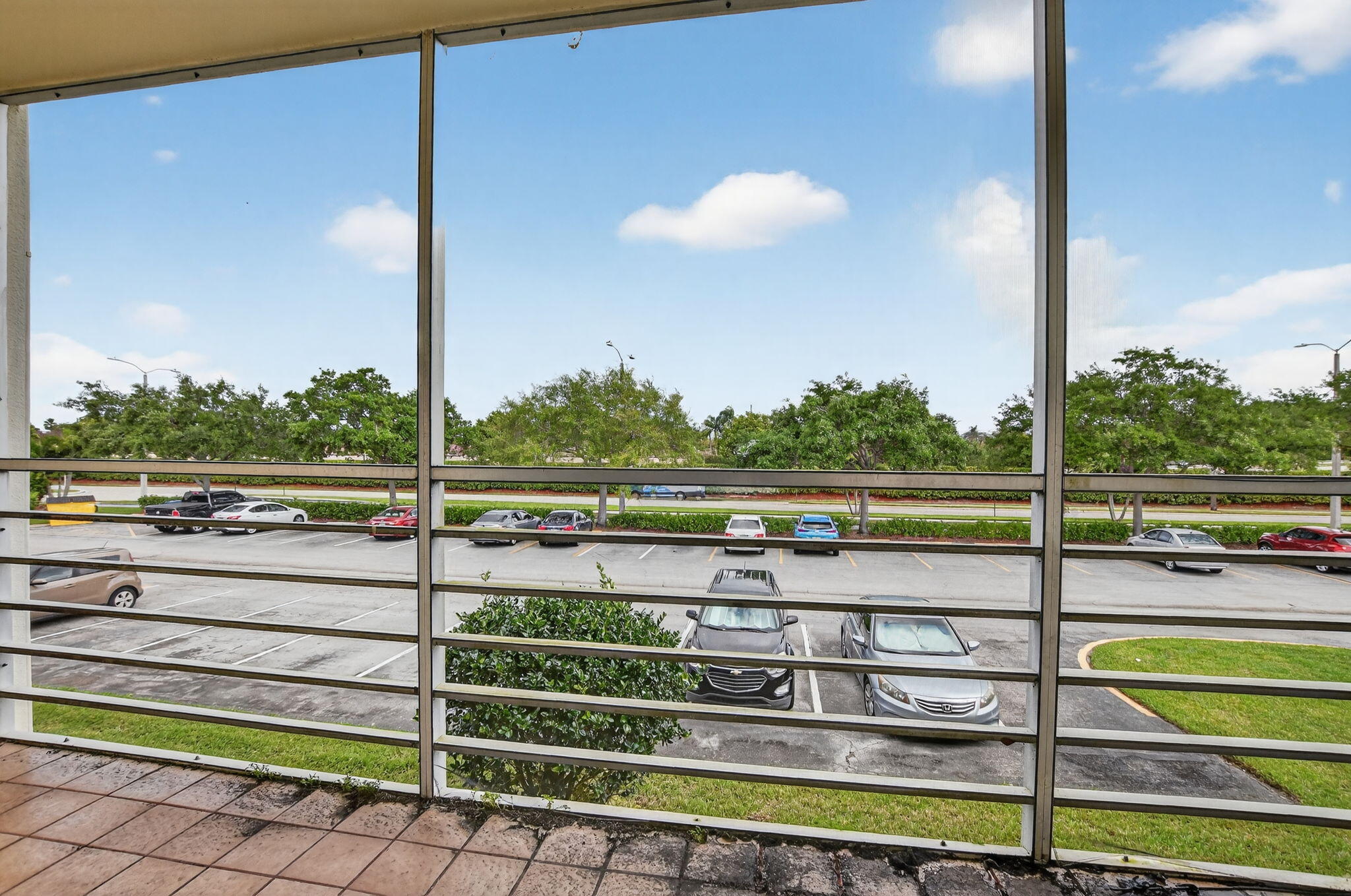 485 Mansfield K Boca Raton, FL 33434 - Photo 25 of 73 a view of a balcony with floor to ceiling windows
