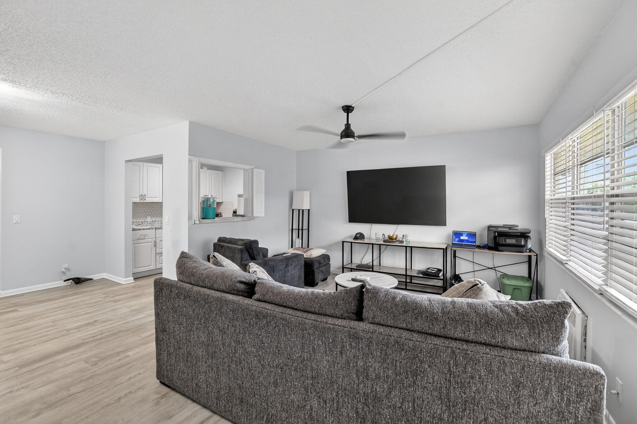 485 Mansfield K Boca Raton, FL 33434 - Photo 4 of 73 a living room with furniture and a flat screen tv