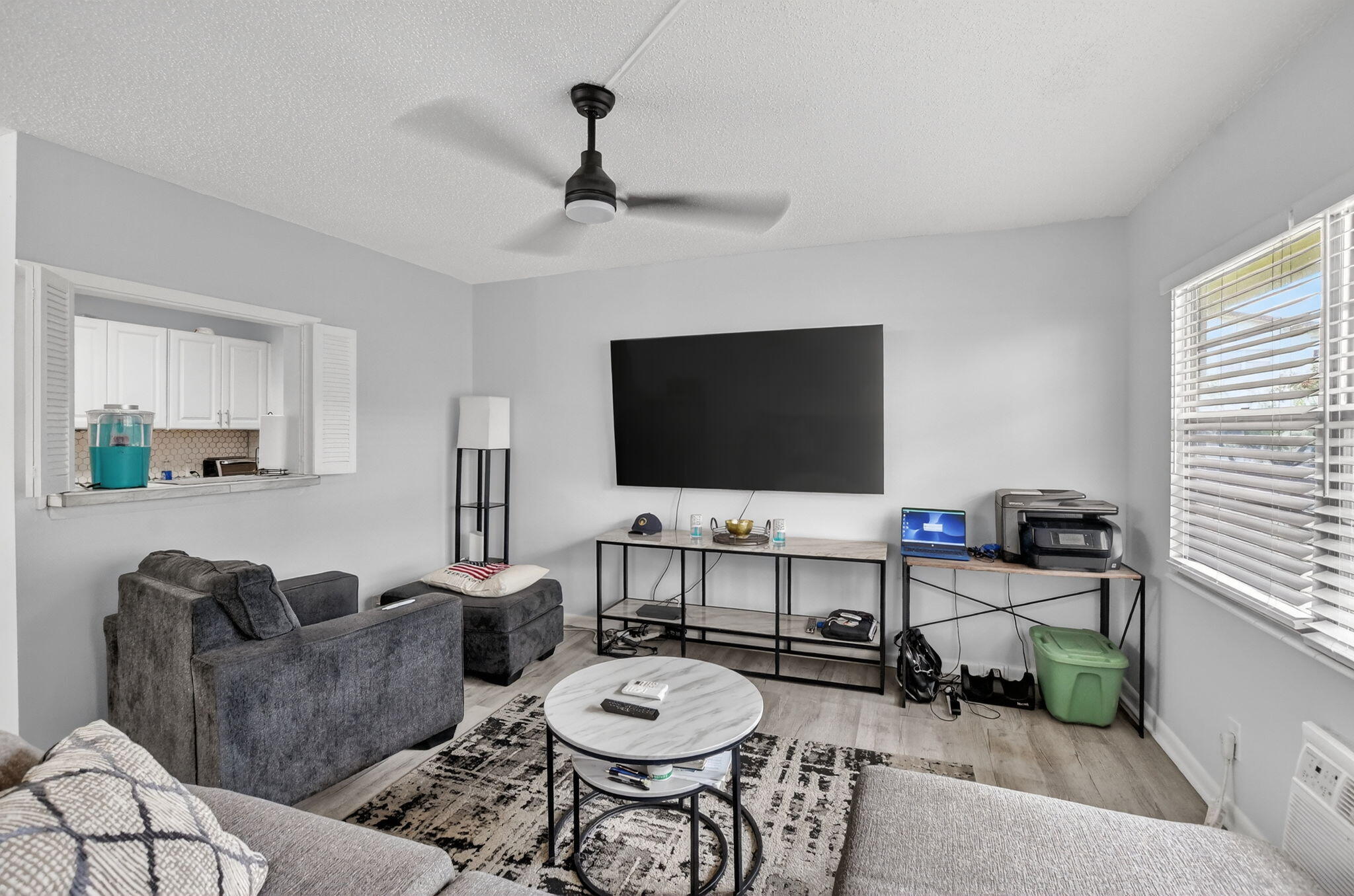 485 Mansfield K Boca Raton, FL 33434 - Photo 5 of 73 a living room with furniture and a flat screen tv