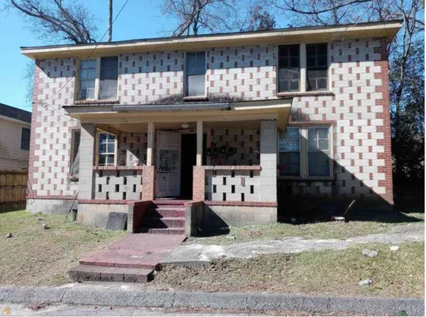 a front view of a house with a porch