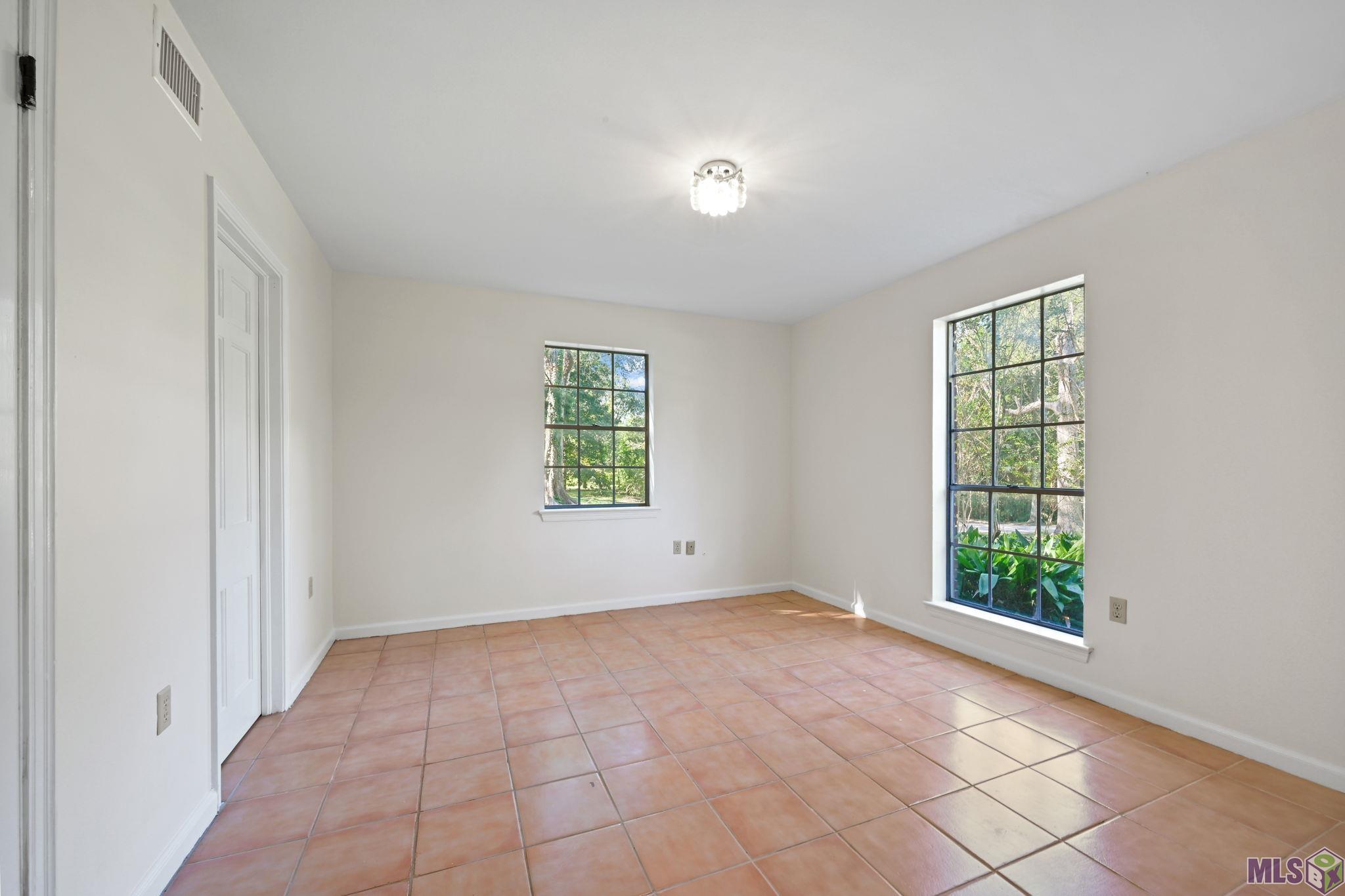 4560 Bluebell Drive Baton Rouge, LA 70808 - Photo 10 of 18 Downstairs bedroom