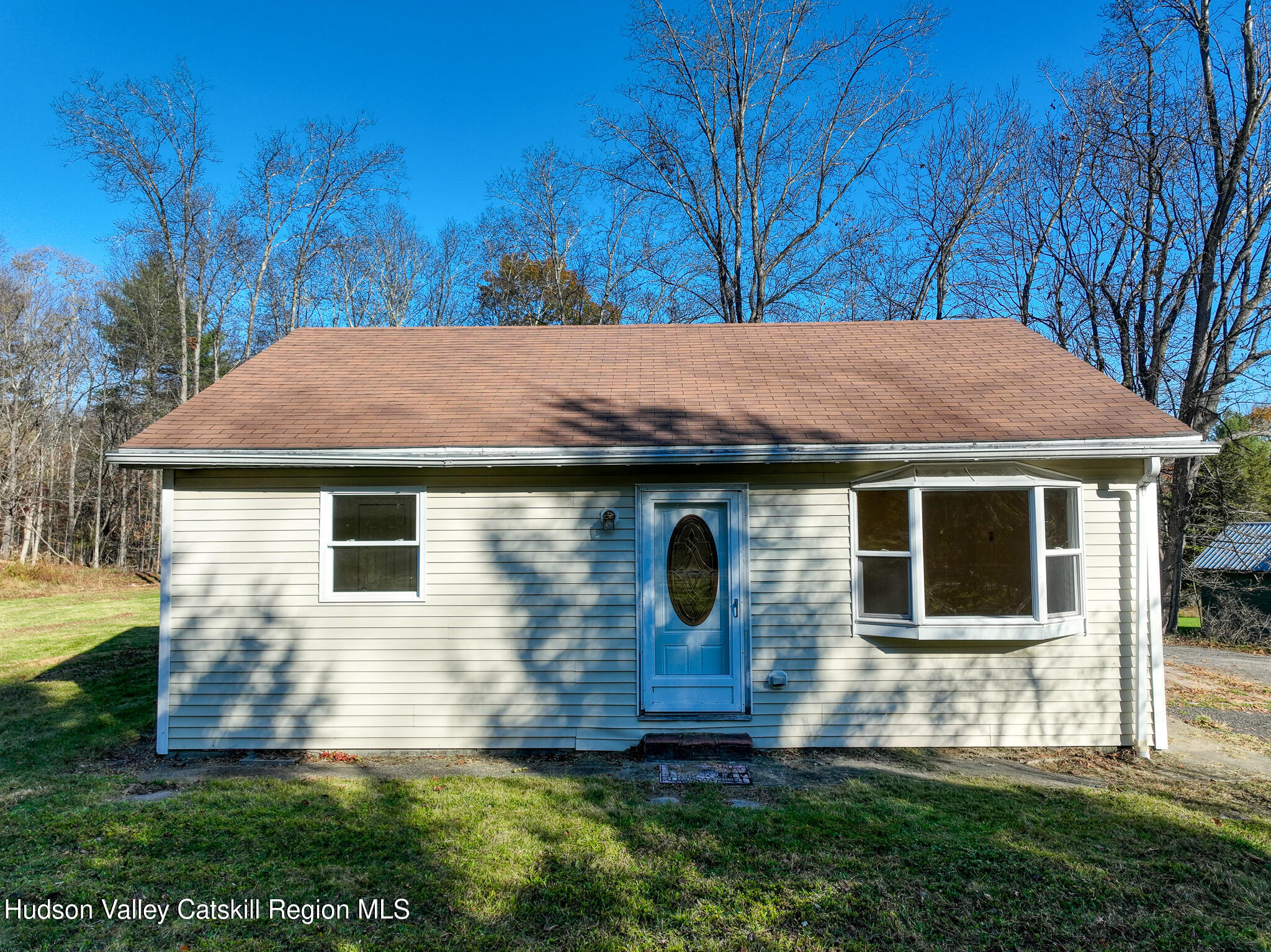 470 Edison Timmerman Road Cairo, NY 12413 - Photo 1 of 29 a backyard of a house with table and chairs
