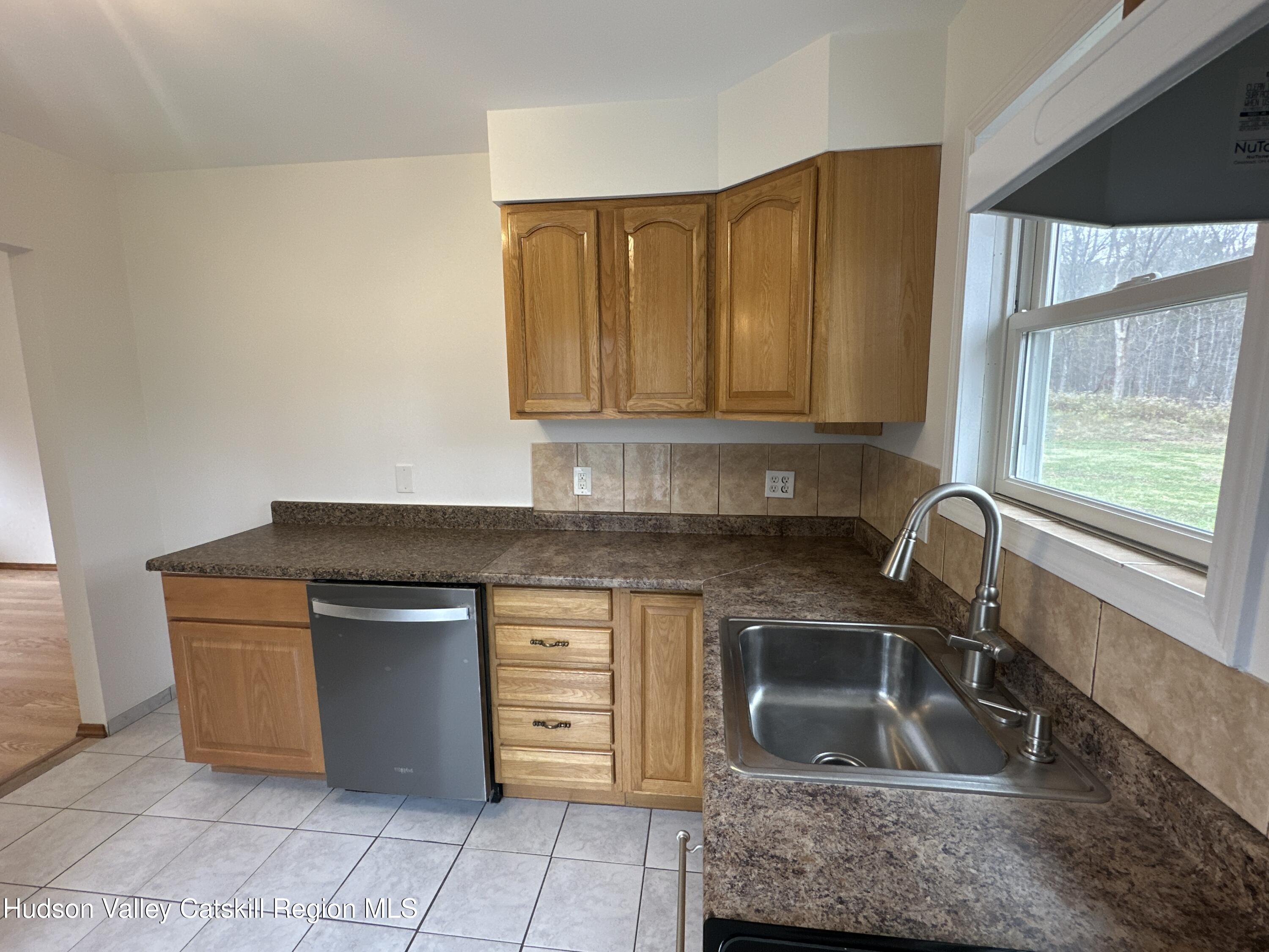 470 Edison Timmerman Road Cairo, NY 12413 - Photo 15 of 29 a kitchen with granite countertop a sink and a stove