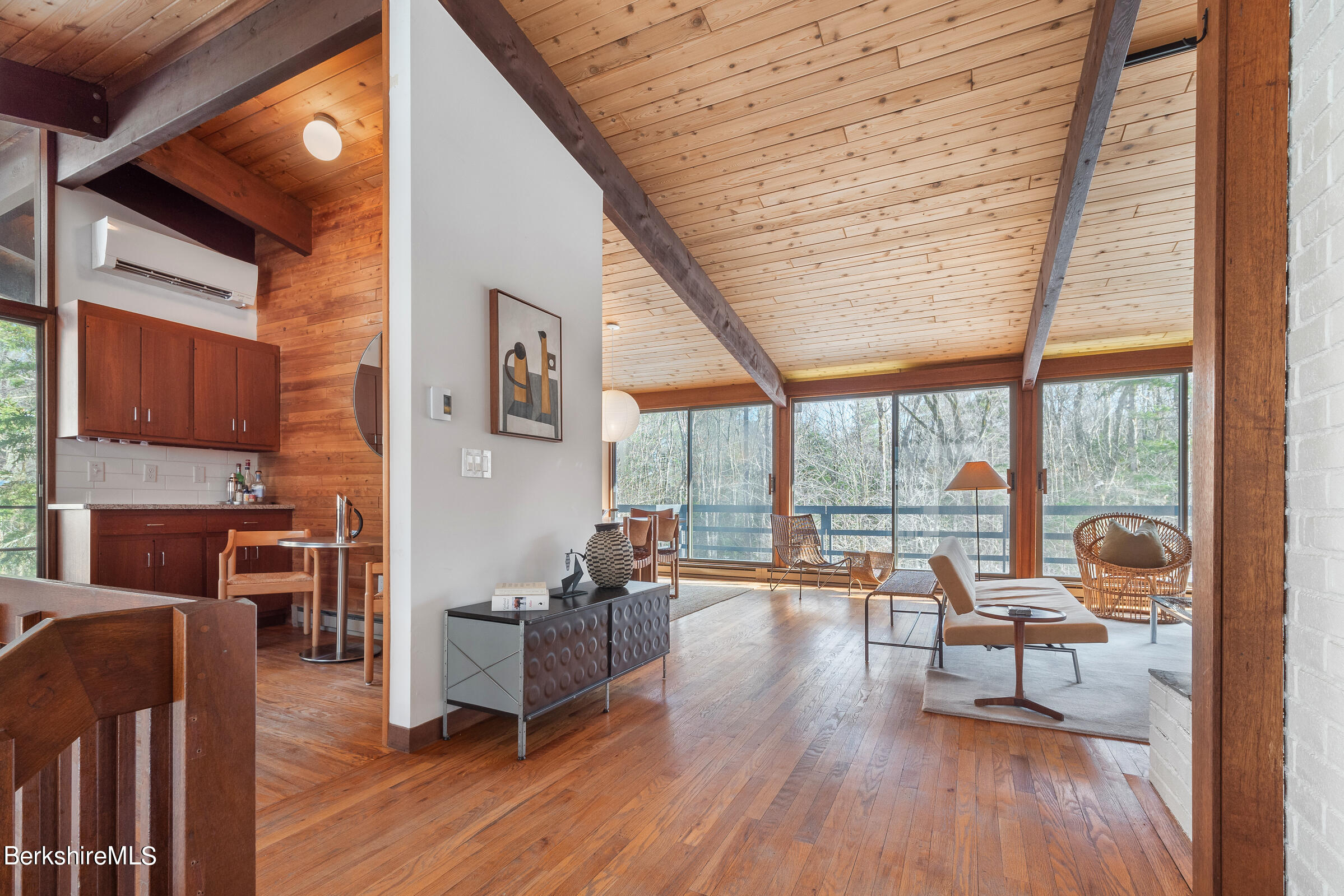 176 Beech Tree Lane Becket, MA 01223 - Photo 13 of 44 a living room with furniture a fireplace and wooden floor