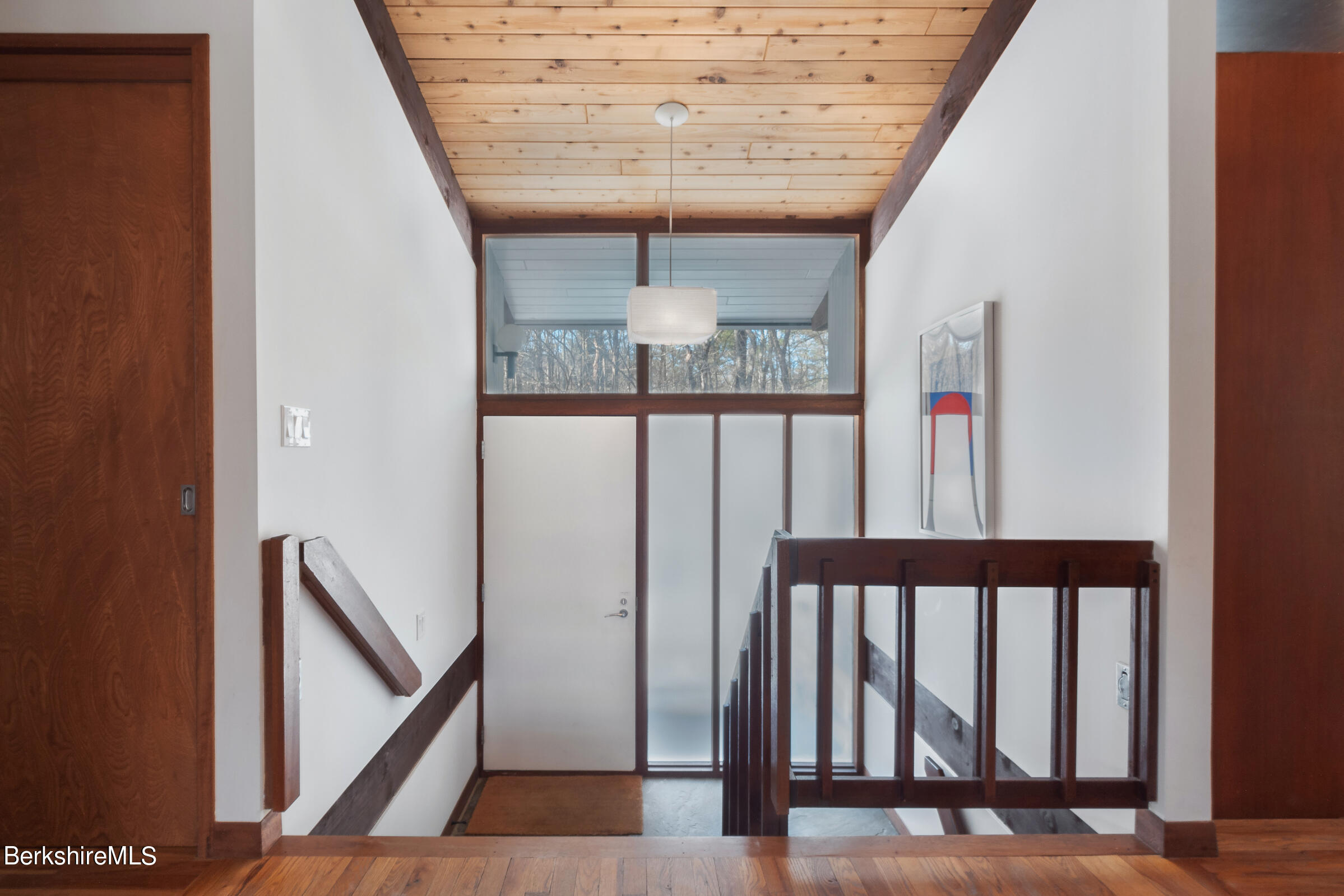 176 Beech Tree Lane Becket, MA 01223 - Photo 22 of 44 a view of staircase with railing and white walls