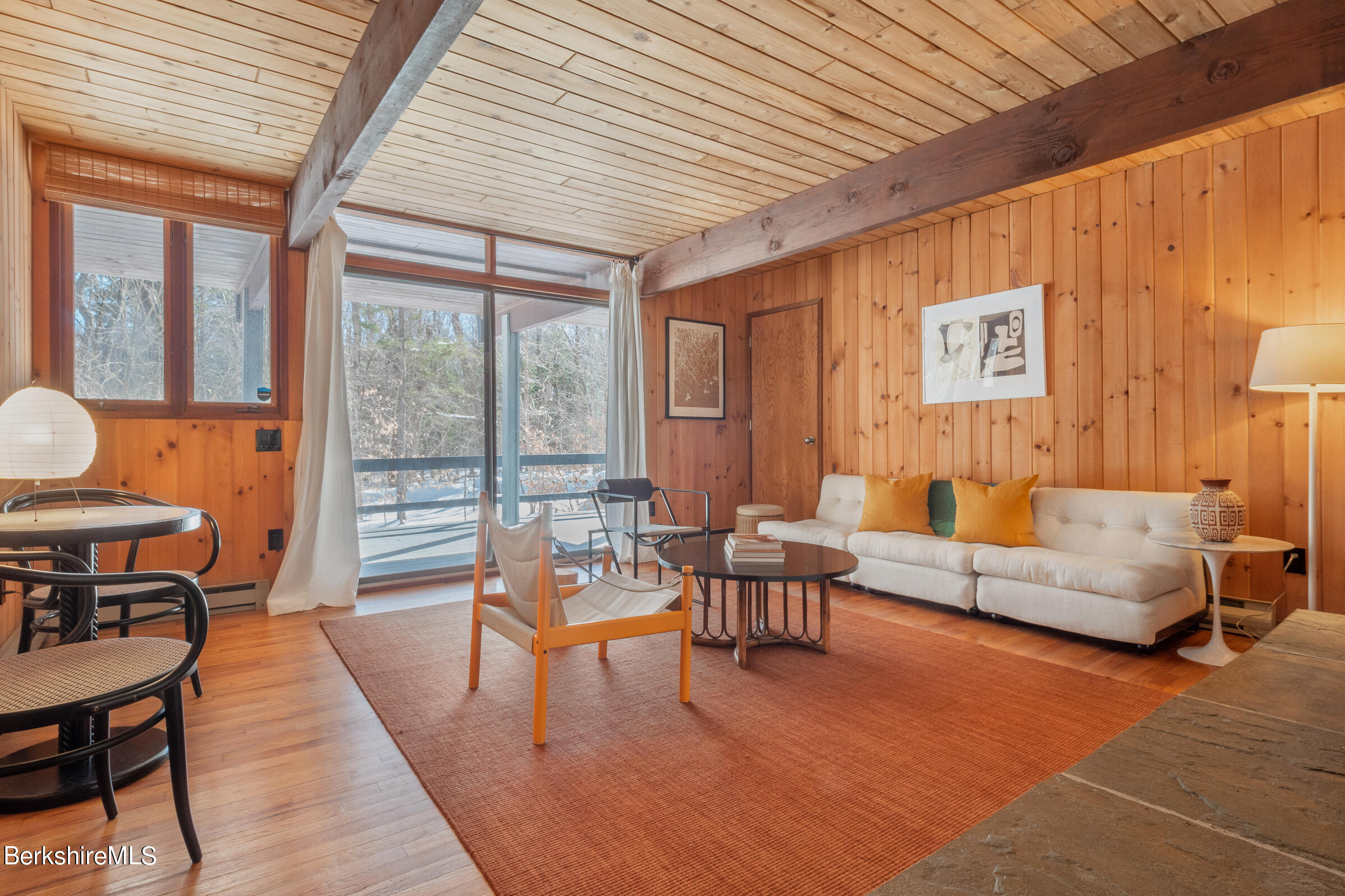 176 Beech Tree Lane Becket, MA 01223 - Photo 25 of 44 a living room with furniture and a large window