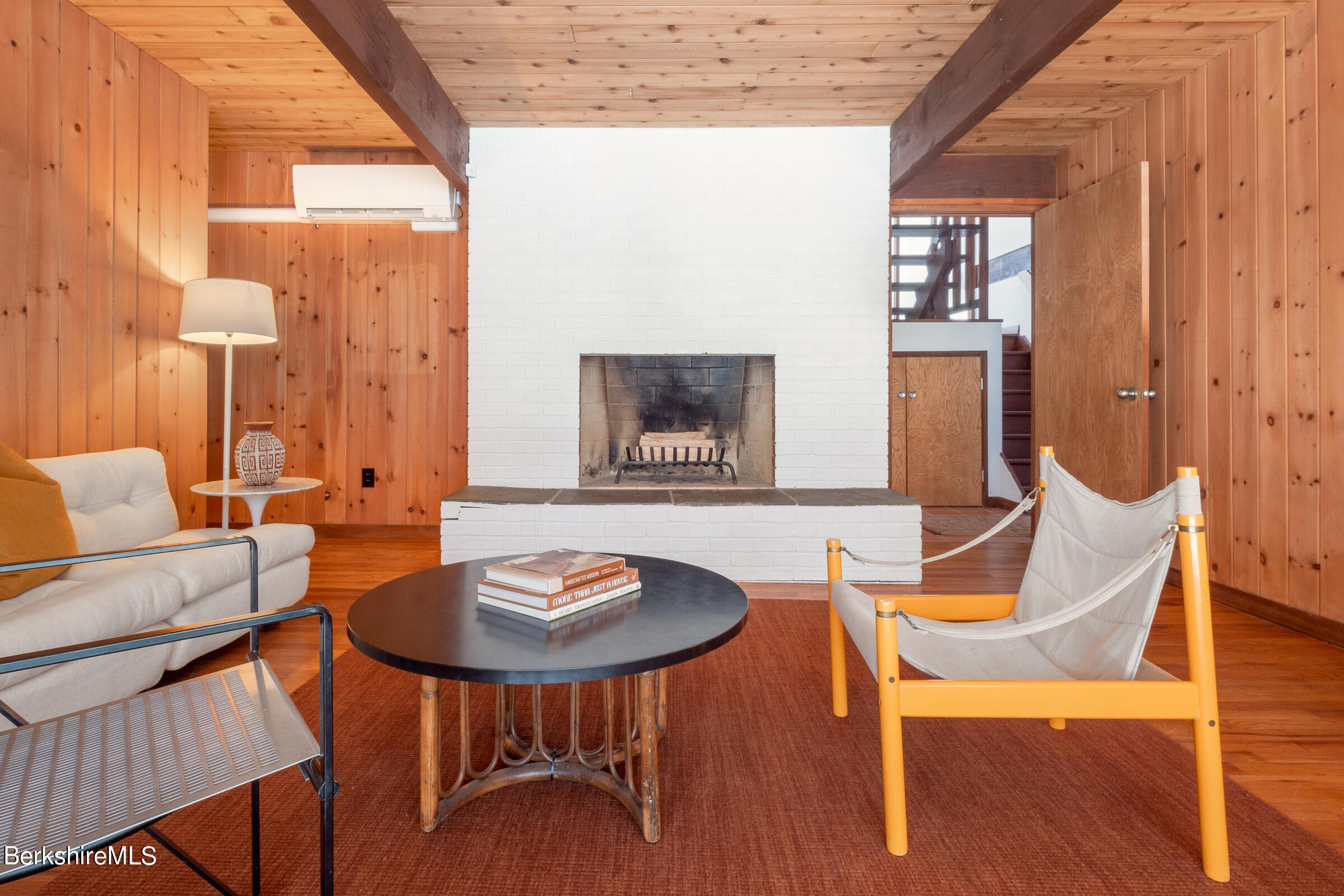 176 Beech Tree Lane Becket, MA 01223 - Photo 26 of 44 a balcony with table and chairs