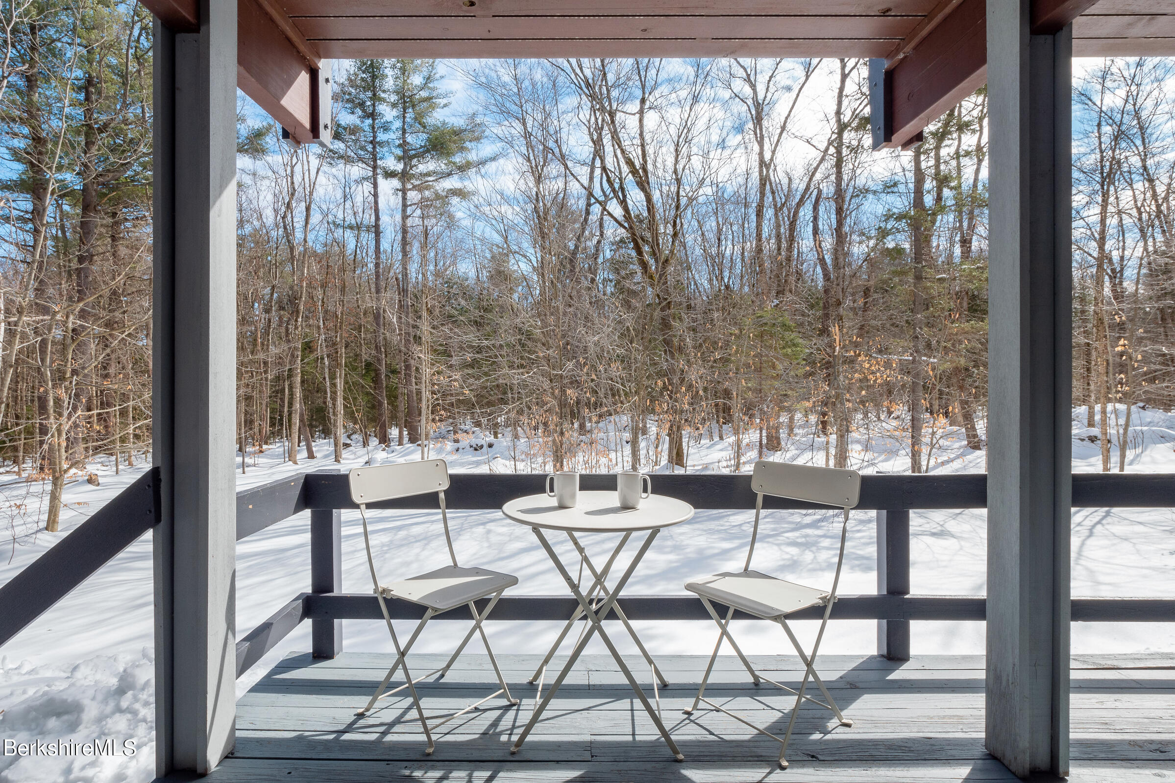 176 Beech Tree Lane Becket, MA 01223 - Photo 29 of 44 a dining room with garden view and patio