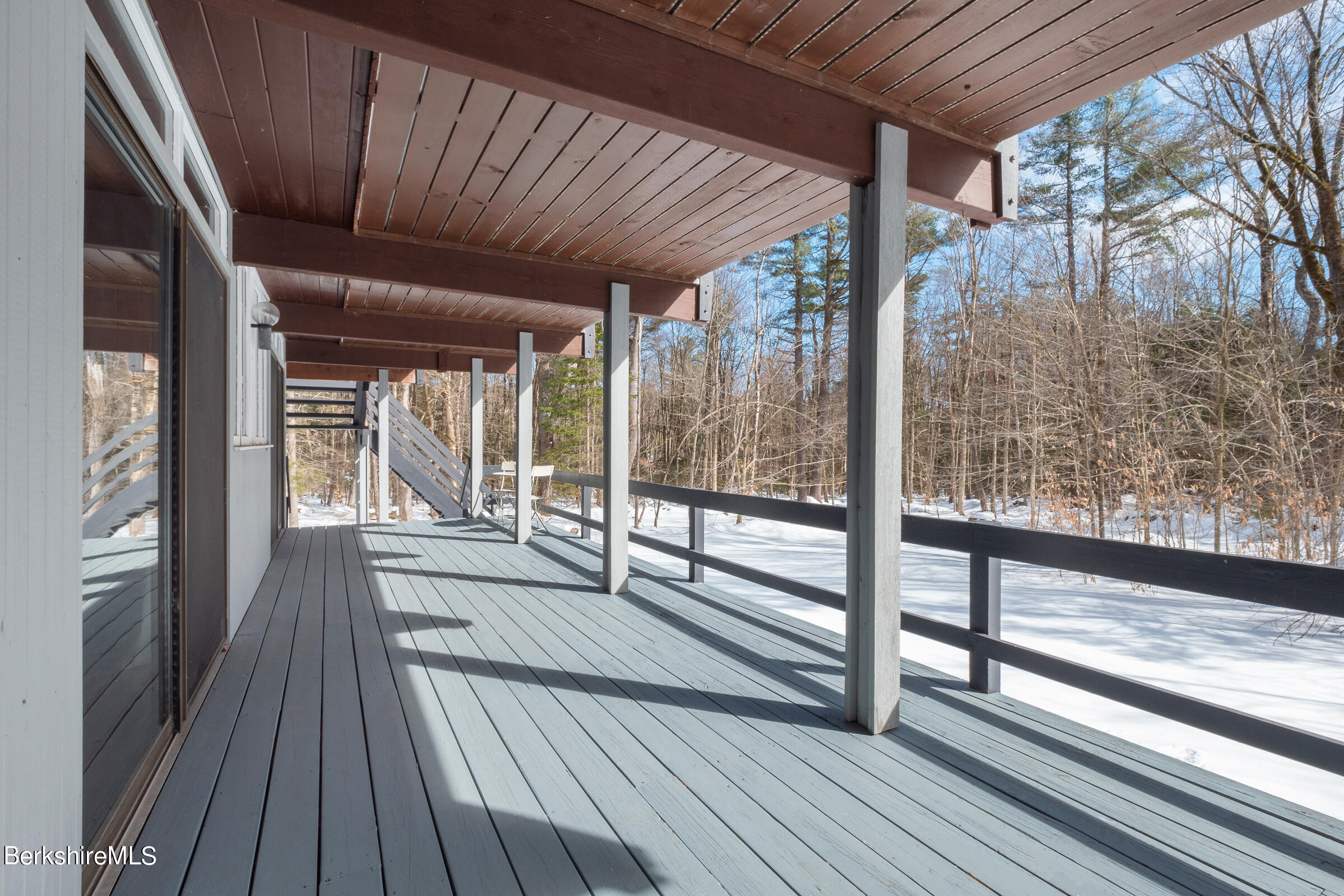 176 Beech Tree Lane Becket, MA 01223 - Photo 30 of 44 a view of a balcony with wooden floor
