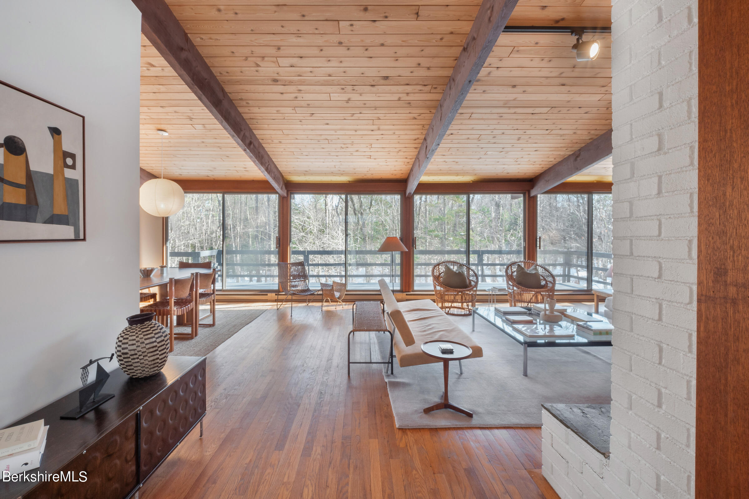 176 Beech Tree Lane Becket, MA 01223 - Photo 4 of 44 a very nice looking room with a large window and wooden floor