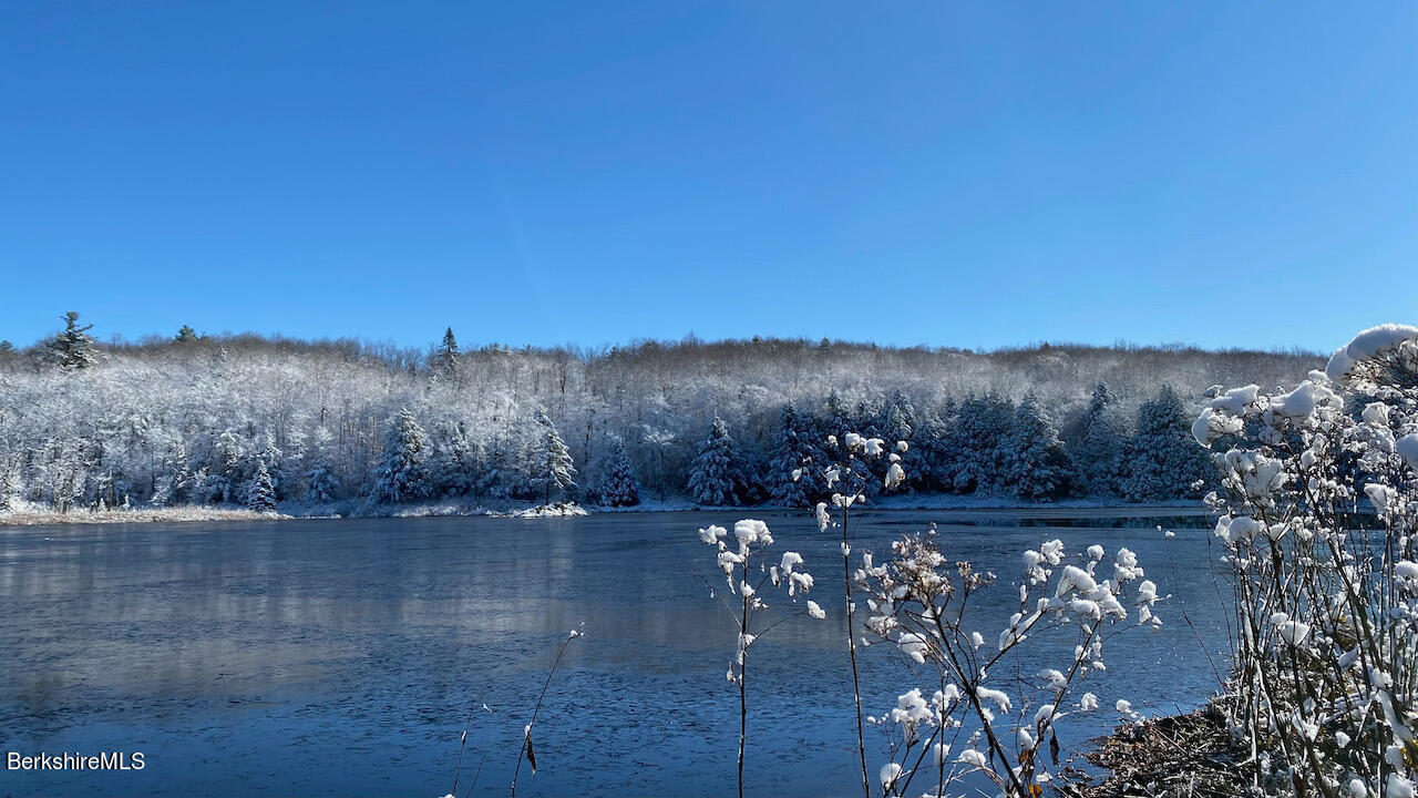 176 Beech Tree Lane Becket, MA 01223 - Photo 41 of 44 a view of swimming pool with mountain in background