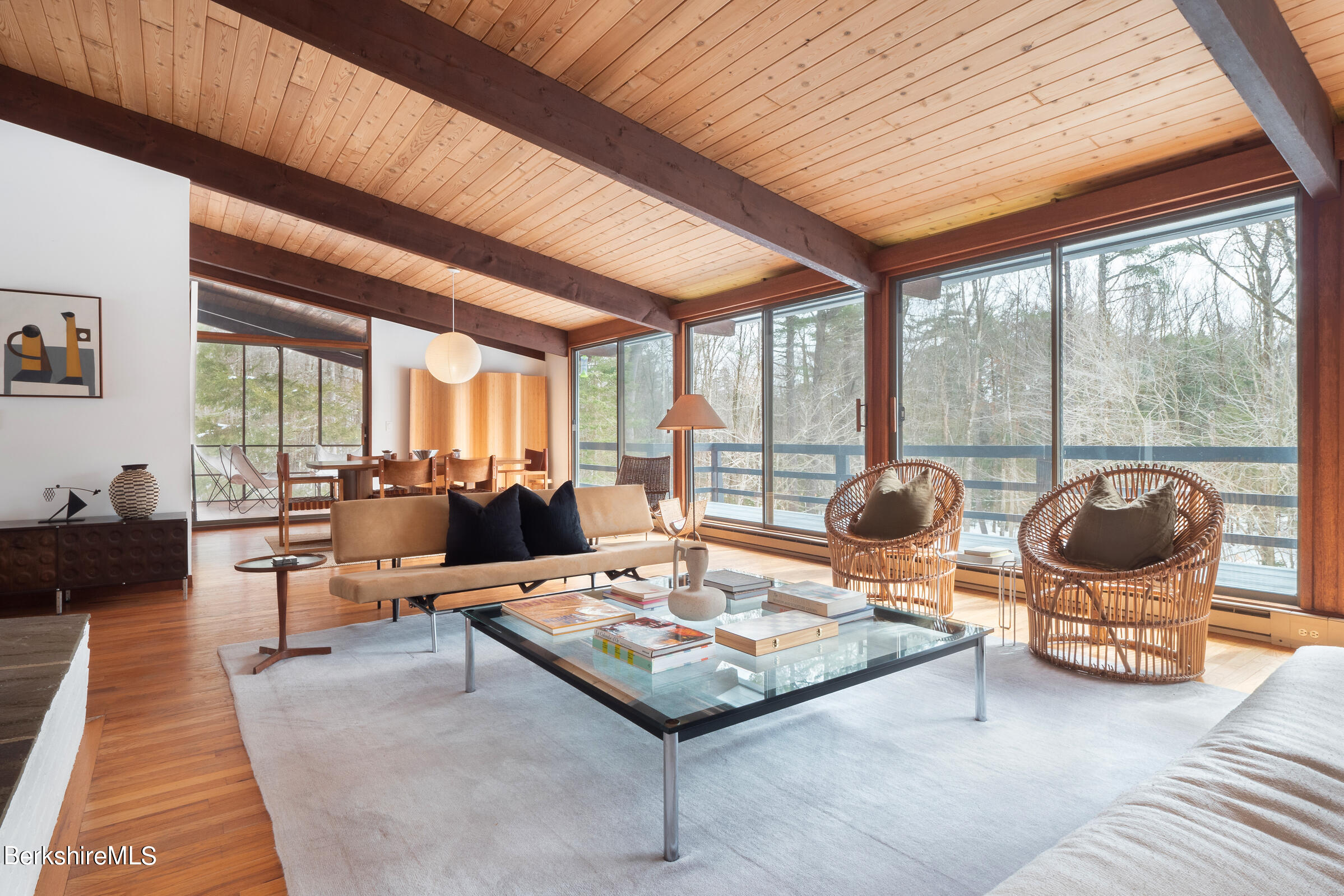 176 Beech Tree Lane Becket, MA 01223 - Photo 8 of 44 a living room with furniture and a floor to ceiling window