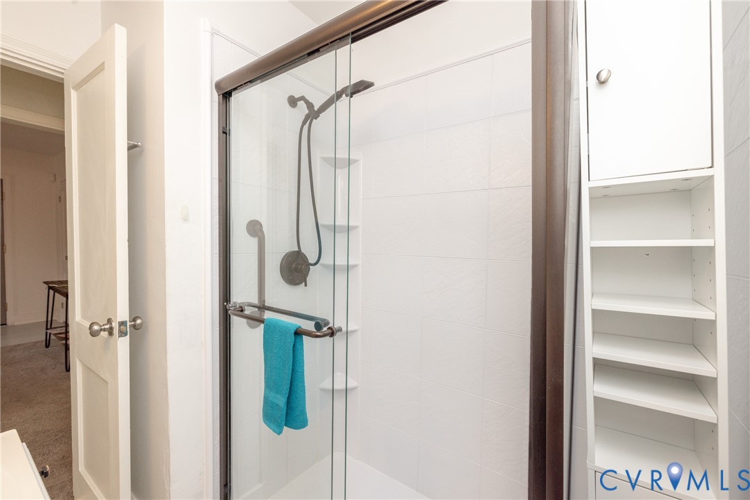 2904 Bethlehem Road Henrico, VA 23228 - Photo 16 of 22 a bathroom with a glass shower door