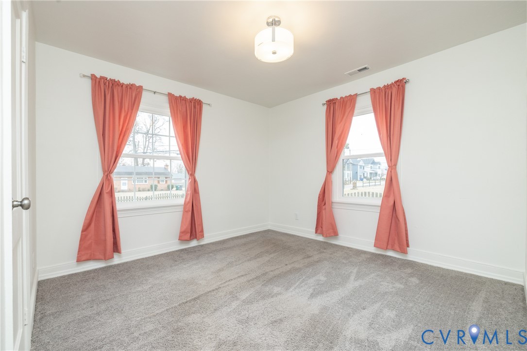 2904 Bethlehem Road Henrico, VA 23228 - Photo 18 of 22 an empty room with windows