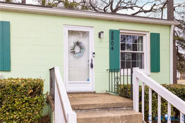 a front view of a house with a porch