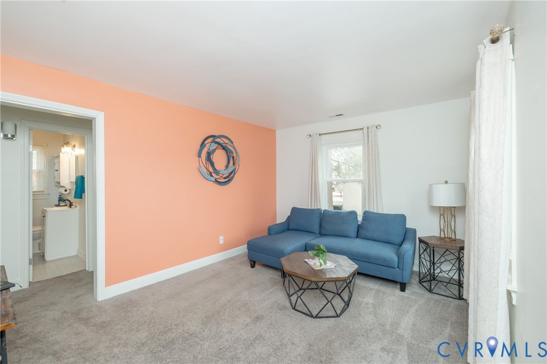 2904 Bethlehem Road Henrico, VA 23228 - Photo 7 of 22 a living room with furniture and a window
