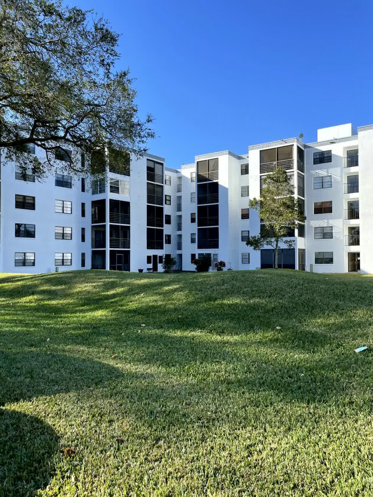 9235 Southwest 8th Street, Unit 114 Boca Raton, FL 33428 - Photo 23 of 24 BLDG Rear