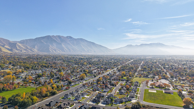 368 East 700 North Springville, UT 84663 - Photo 30 of 55 Aerial view of residential area featuring a mountain backdrop