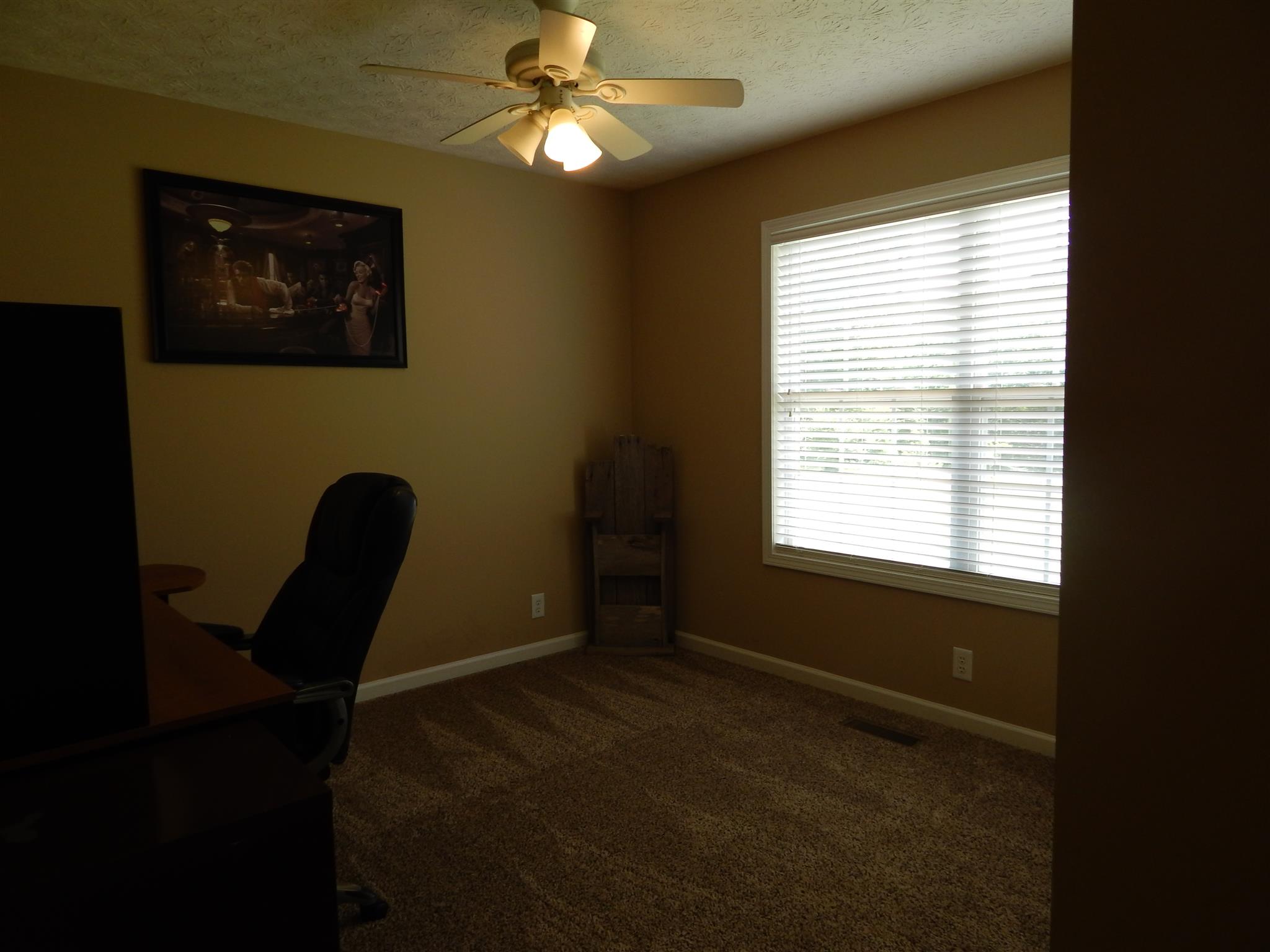 1533 Rapids Road Portland, TN 37148 - Photo 13 of 17 a view of a workspace with furniture and a window