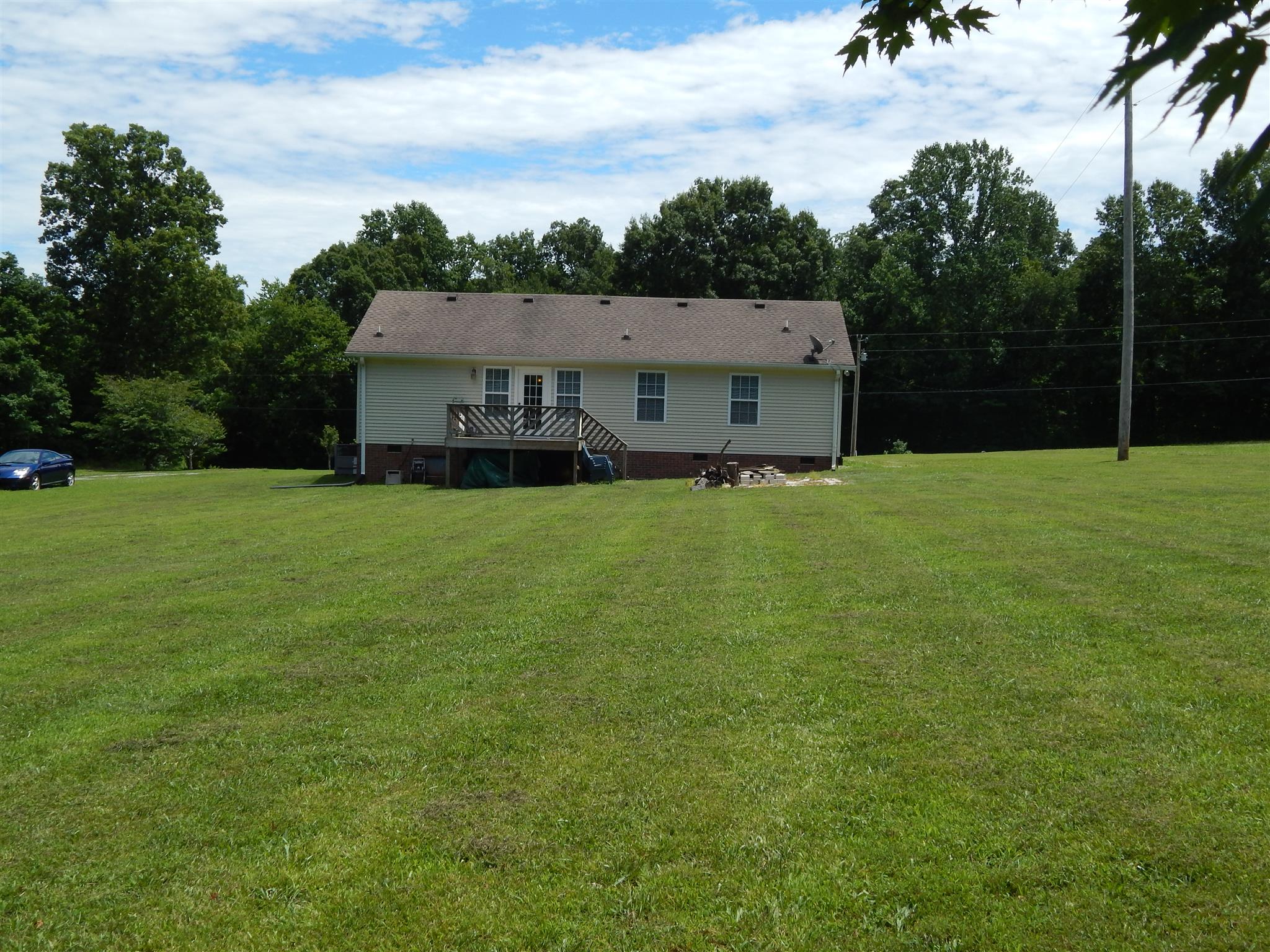 1533 Rapids Road Portland, TN 37148 - Photo 17 of 17 a view of a house with a yard