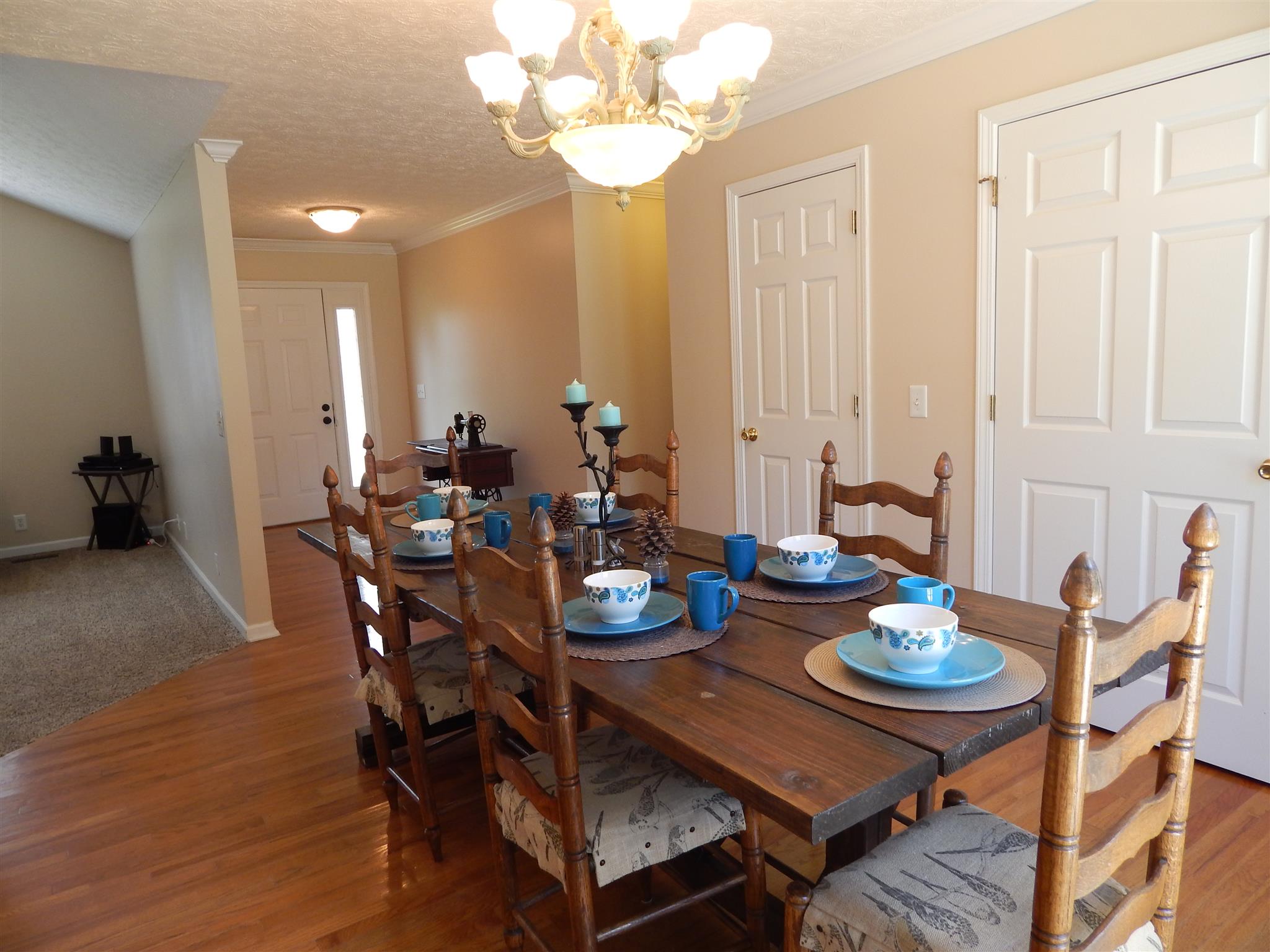 1533 Rapids Road Portland, TN 37148 - Photo 5 of 17 a view of a dining room with furniture and wooden floor