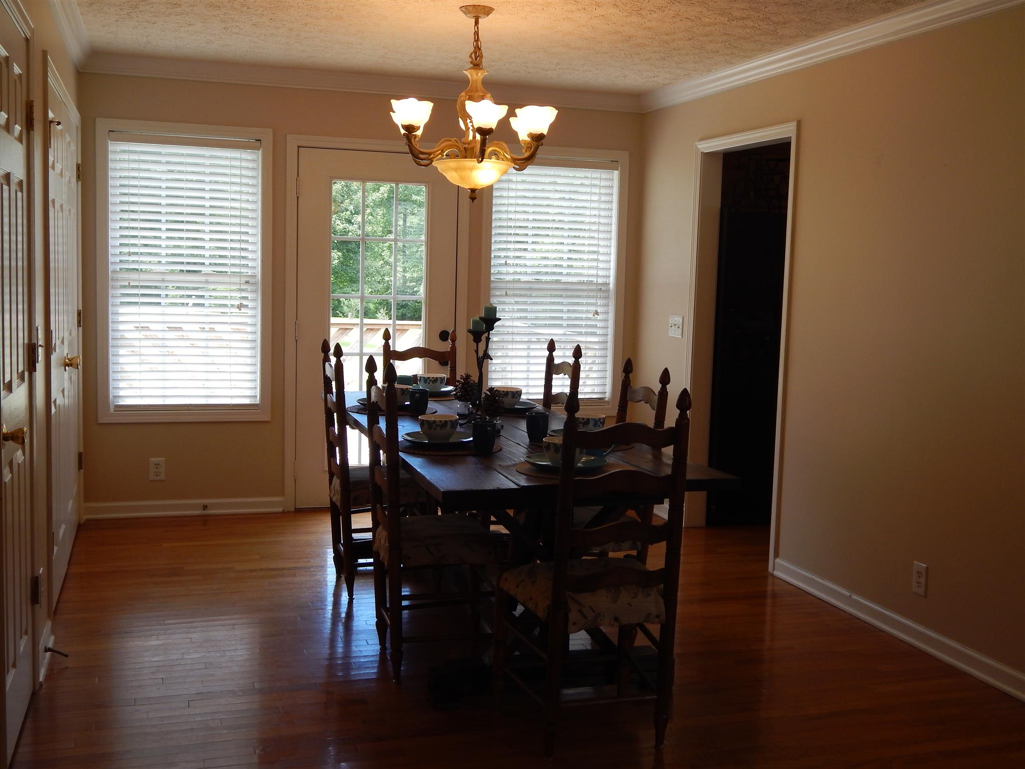 1533 Rapids Road Portland, TN 37148 - Photo 6 of 17 a view of a dining room with furniture window and wooden floor