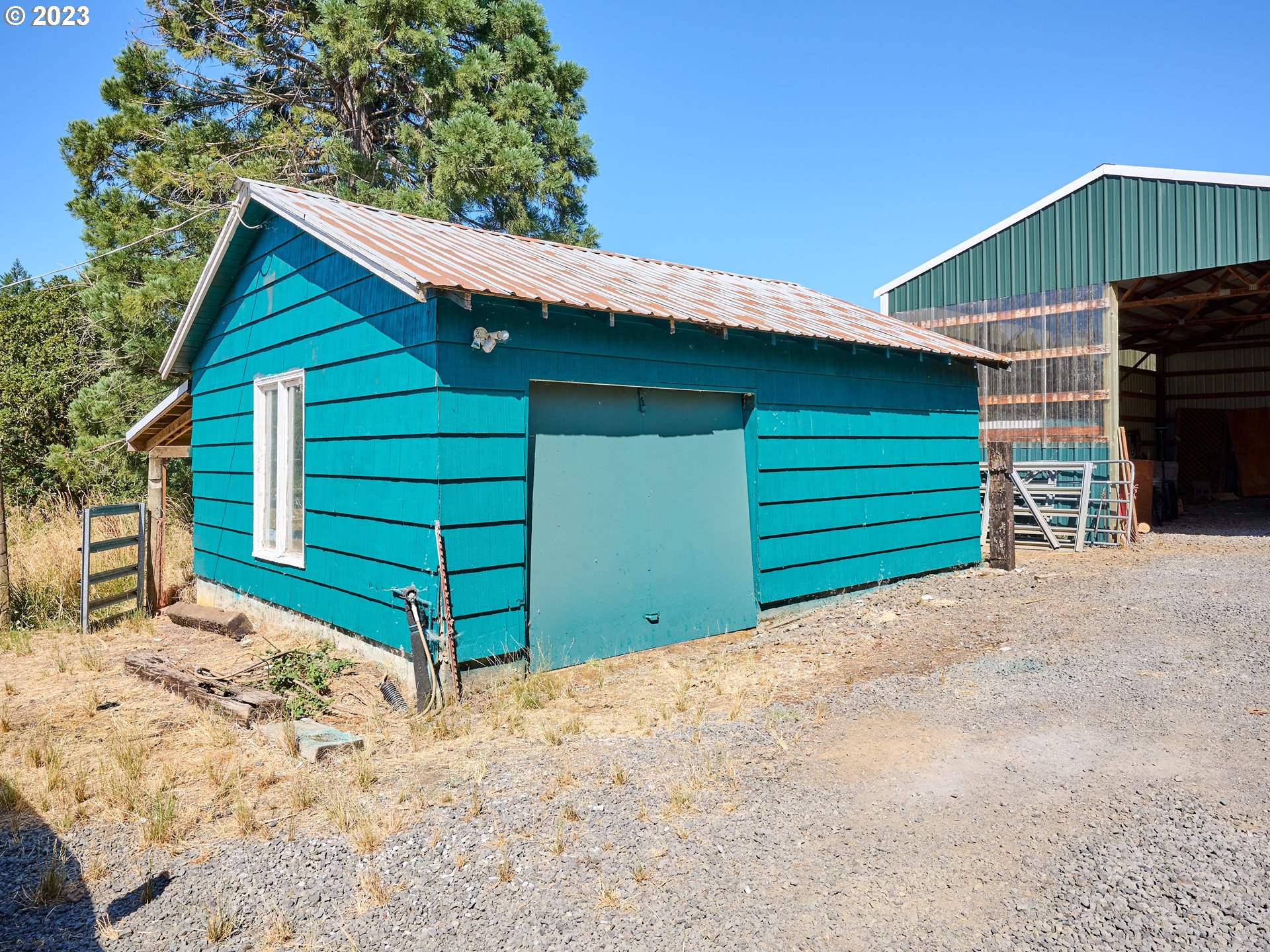 20140 Northeast Dopp Road Newberg, OR 97132 - Photo 35 of 46 a view of a house with a yard and garage