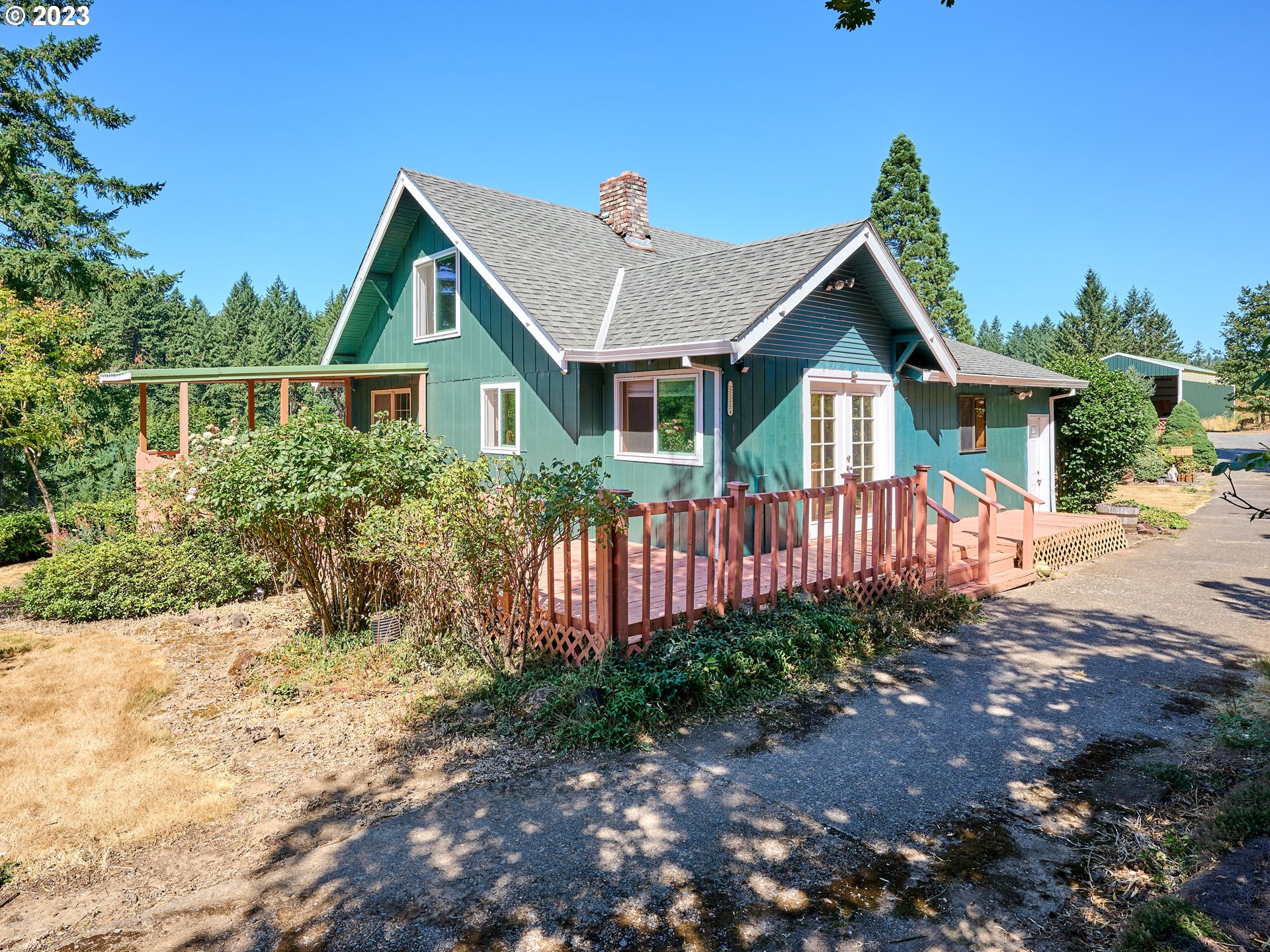 20140 Northeast Dopp Road Newberg, OR 97132 - Photo 4 of 46 a front view of house with yard and trees around