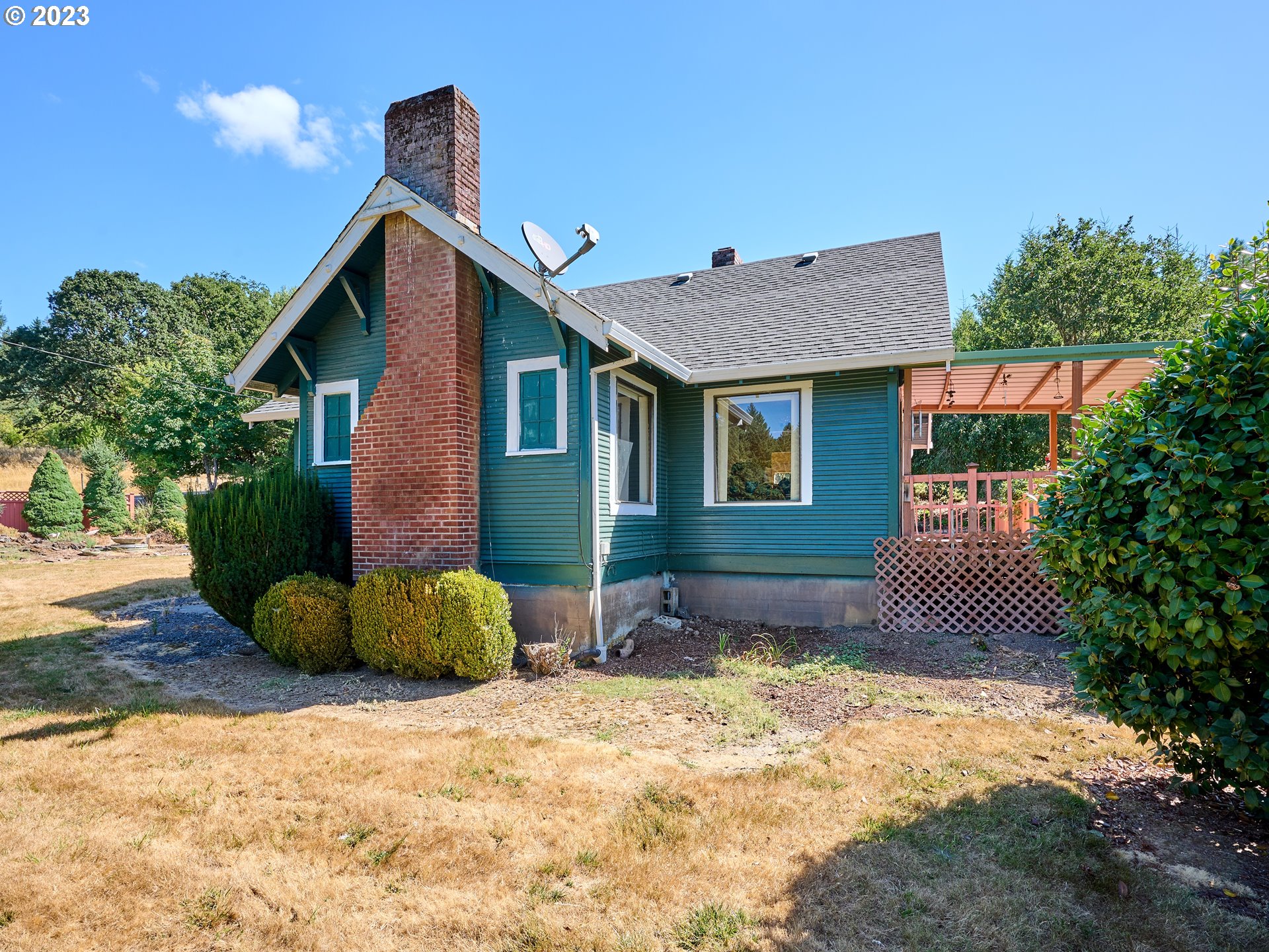20140 Northeast Dopp Road Newberg, OR 97132 - Photo 8 of 46 a front view of a house with a yard