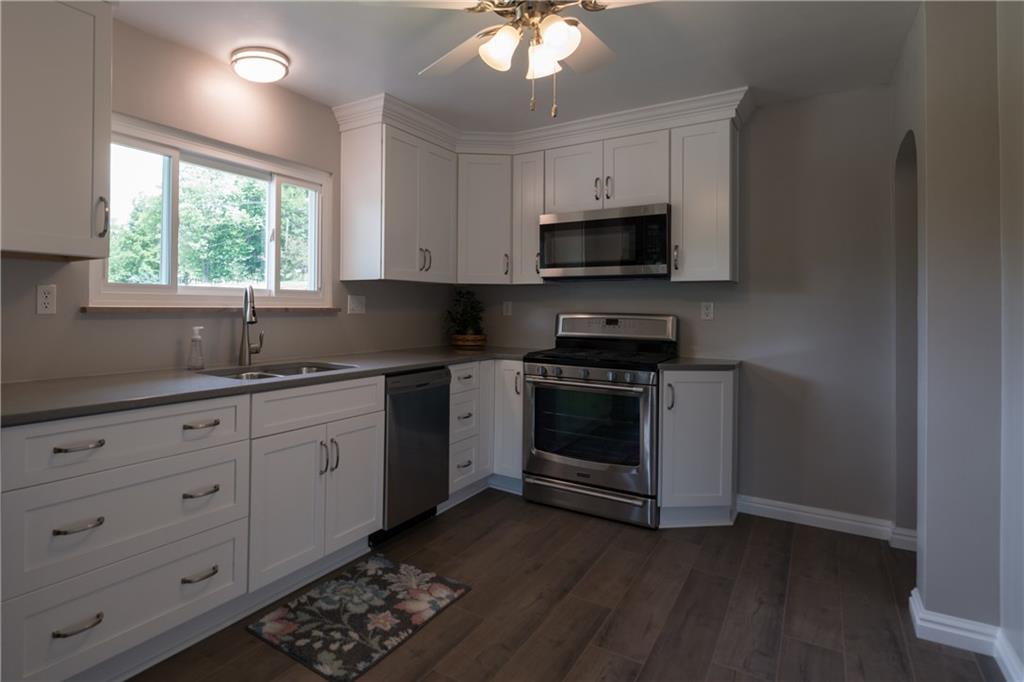 13 Weber Road Jeannette, PA 15644 - Photo 6 of 19 Brand New Kitchen ~ Quartz countertop & Stainless appliances.