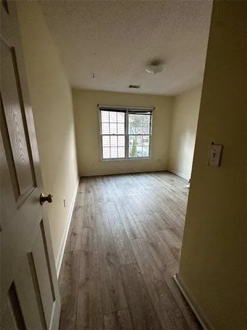 a view of hallway with washer and dryer