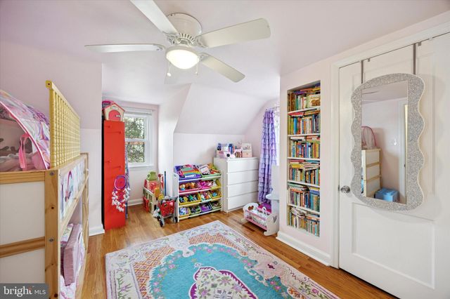 a room with furniture and a book shelf