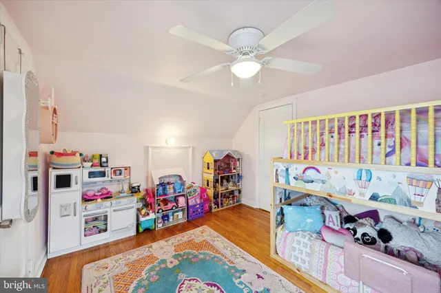 a bed room with a bed and a window