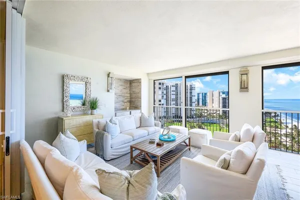 a bedroom with a bed and a mirror