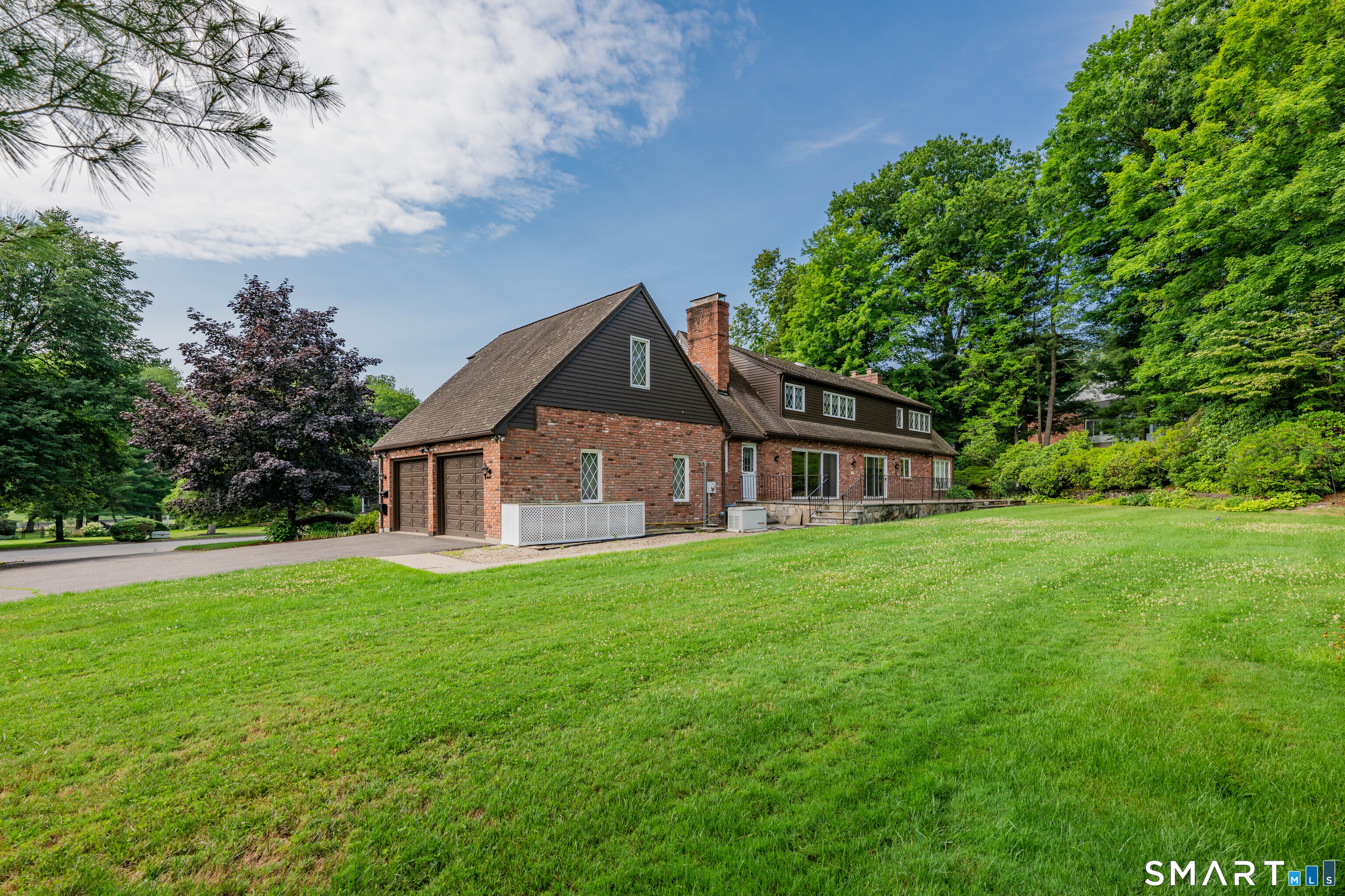232 Maybrook Road Waterbury, CT 06708 - Photo 37 of 38 a front view of a house with yard and green space