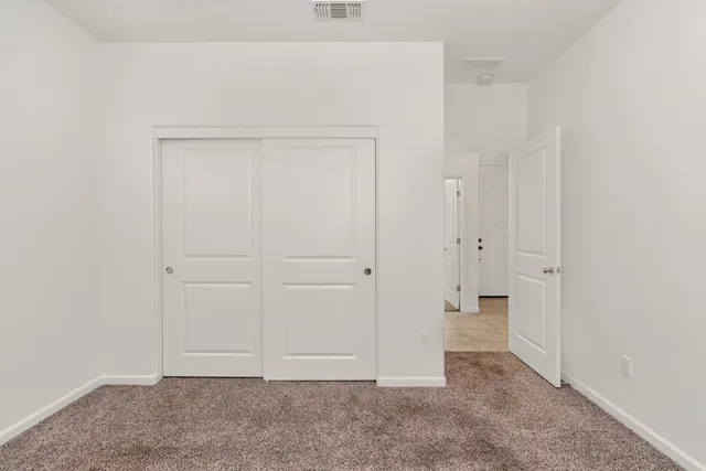 an empty room with cabinet