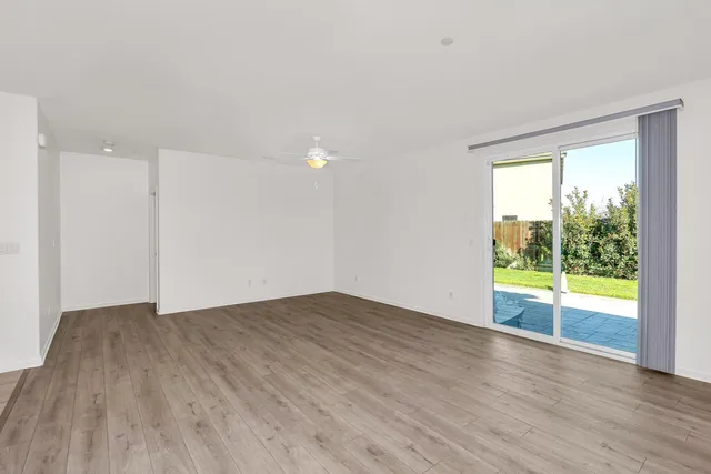a bathroom with a double vanity sink mirror and shower