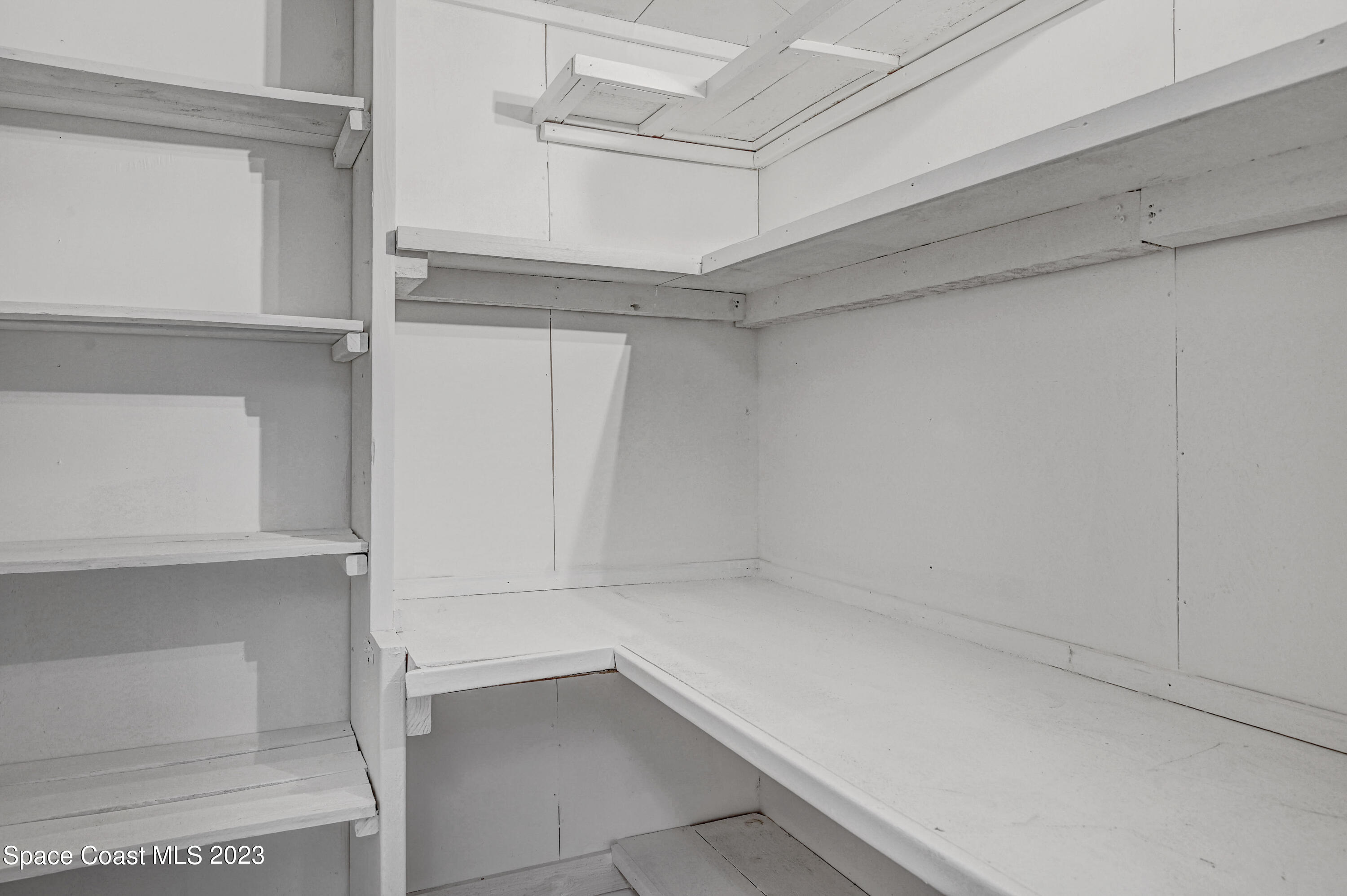 2781 Hereford Road Melbourne, FL 32935 - Photo 17 of 33 a view of an empty walk in closet