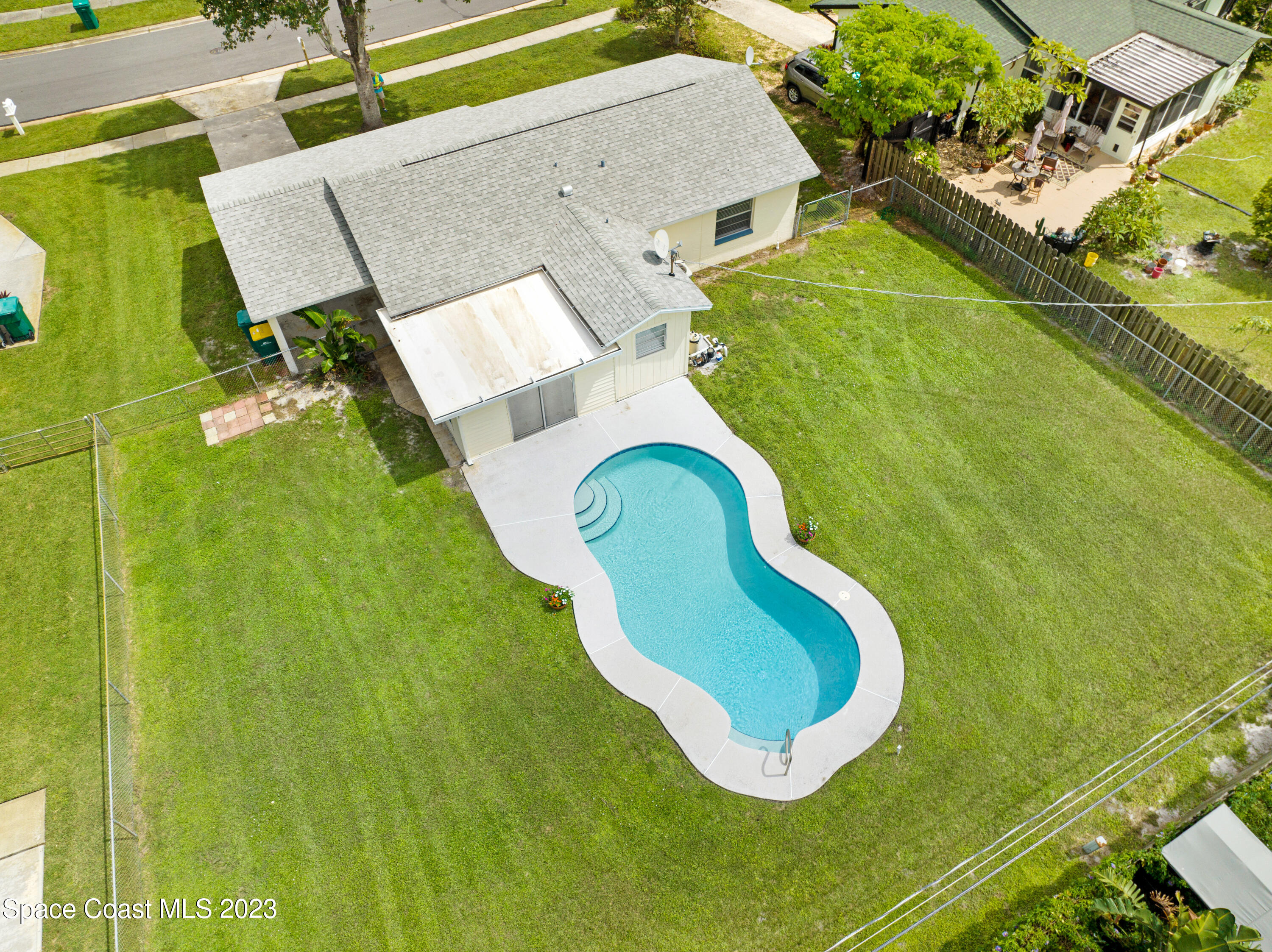 2781 Hereford Road Melbourne, FL 32935 - Photo 3 of 33 an aerial view of a swimming pool
