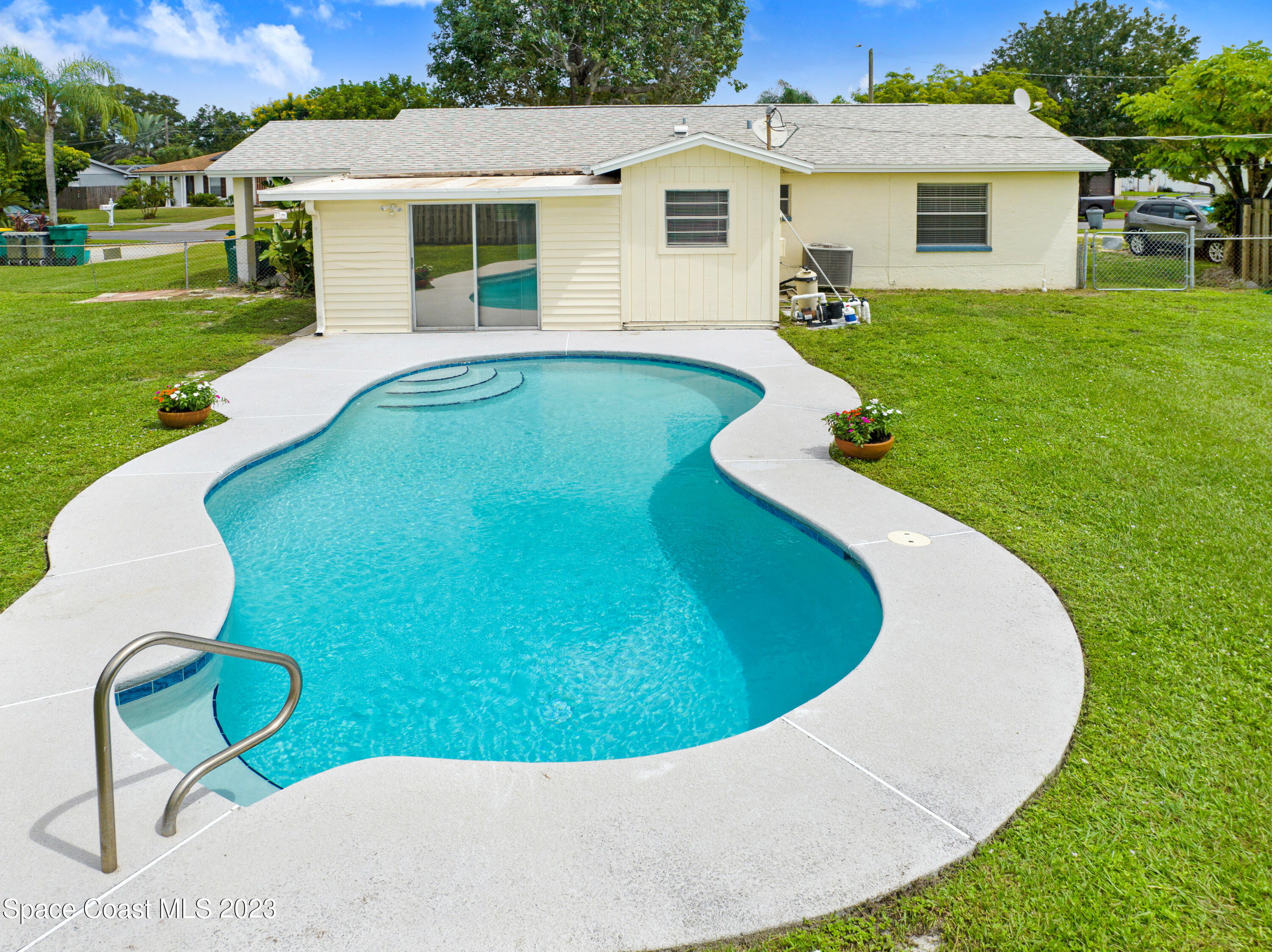 2781 Hereford Road Melbourne, FL 32935 - Photo 31 of 33 a view of a house with backyard