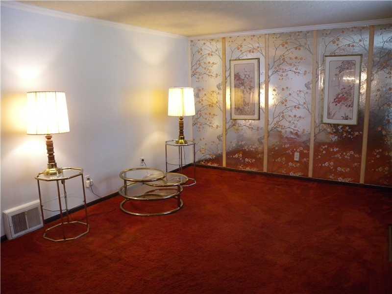 1104 Brinton Road Braddock Hills, PA 15221 - Photo 2 of 20 Living Room. LOOK BENEATH THE CARPETING TO VIEW GREAT LOOKING WOOD FLOORING~~Add your own personal touch to the accent wall~