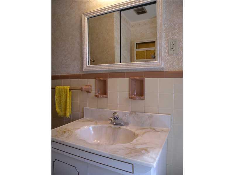 1104 Brinton Road Braddock Hills, PA 15221 - Photo 7 of 20 Full Bath. Wall tile in fantastic condition~Nicely sized vanity with double doors~