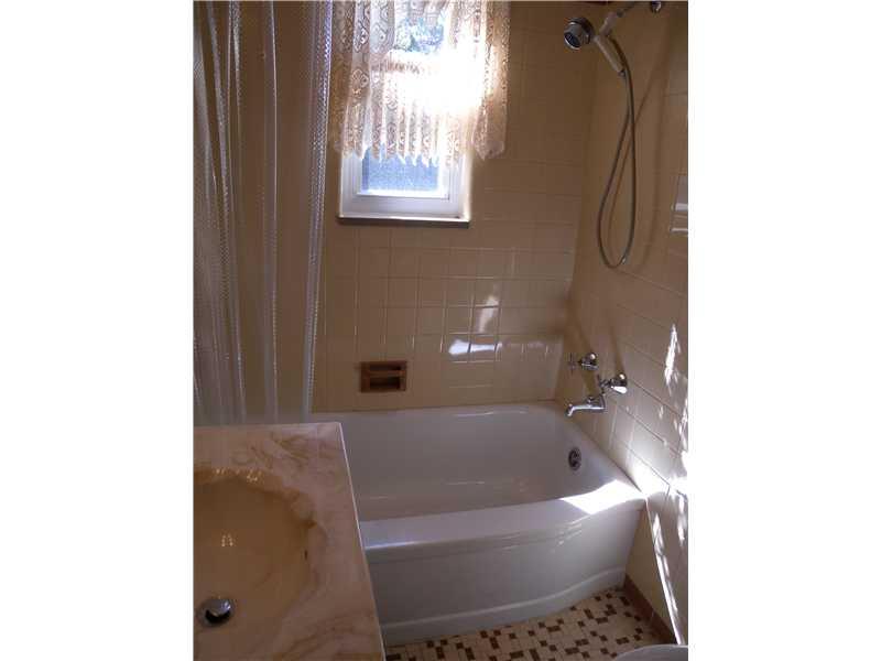 1104 Brinton Road Braddock Hills, PA 15221 - Photo 8 of 20 Full Bath. Tile flooring~Tile surrounding bath~Newer window~Soothing colors~